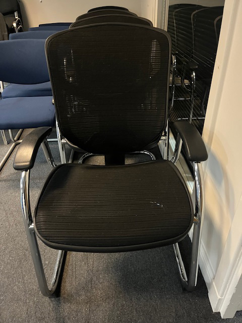 Black mesh meeting chairs